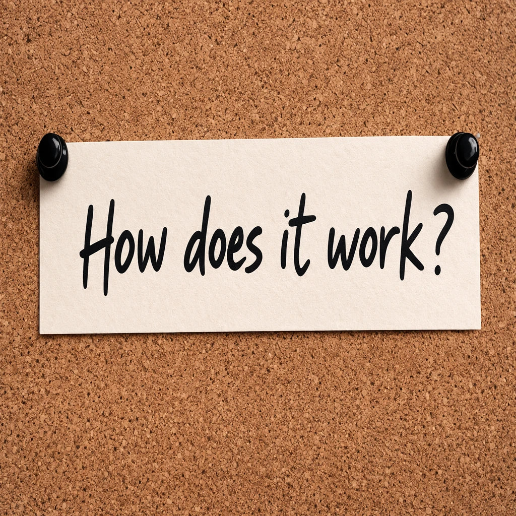a tacked note saying "how does it work" on a cork backdrop
