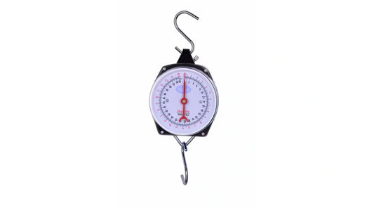Hanging dial scale with a metal hook on a plain light background